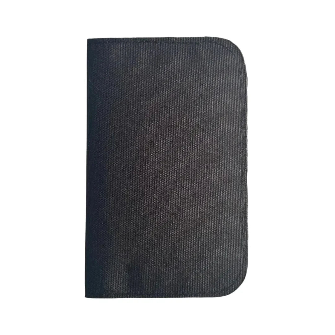 Recycled Firefighter Field Notes Wallet made of black XPAC material, compact wallet with card slots and durable design.