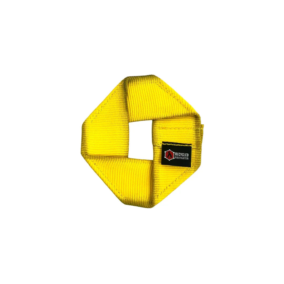 Yellow Fire Hose Dog Frisbee JR from Recycled Firefighter, a durable dog toy made from recycled fire hose material.