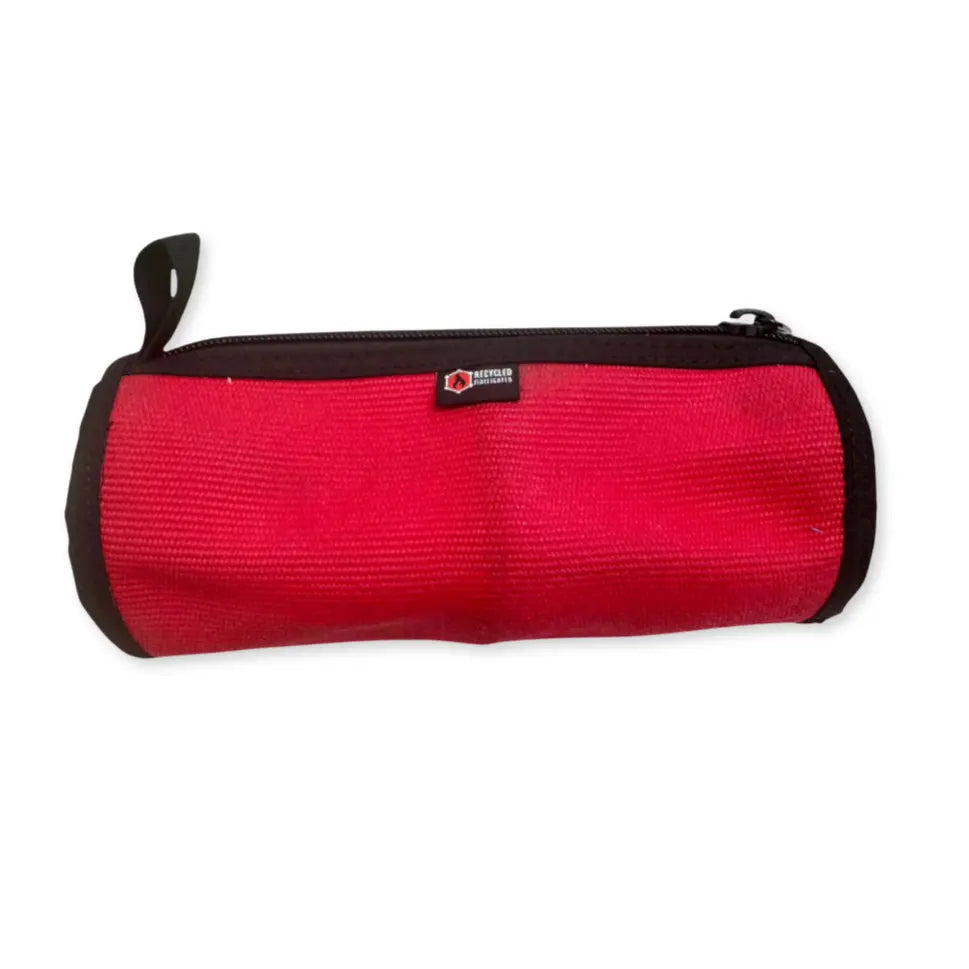 Red Recycled Firefighter fire hose Dopp kit with durable fabric and zipper closure, designed for travel and organization.