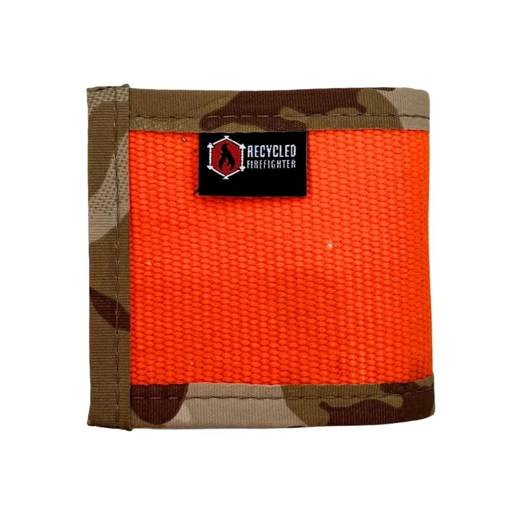 Orange fire hose drink sleeve by Recycled Firefighter featuring a durable, recycled firefighter-themed design on a standard size sleeve.