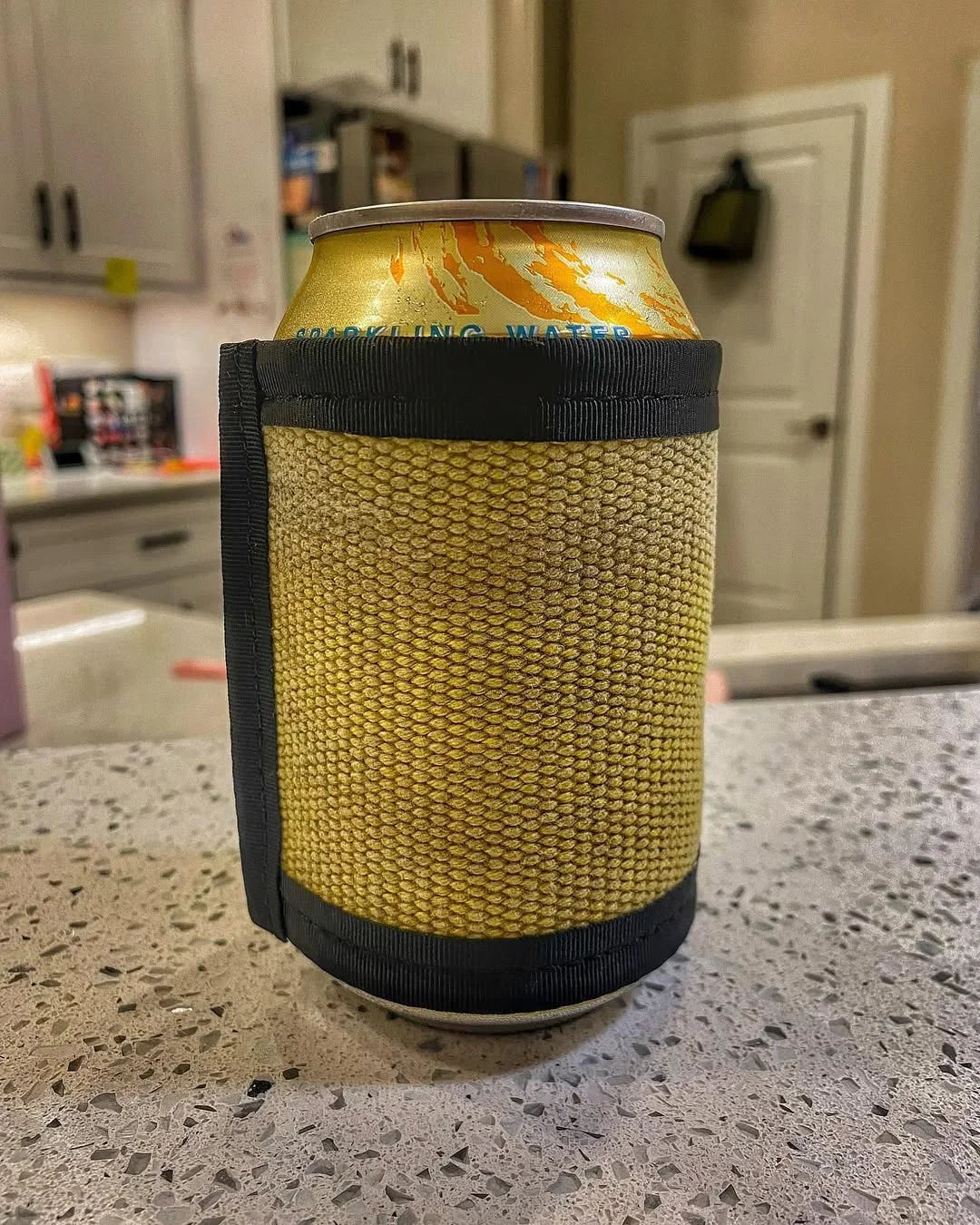 Recycled Firefighter Firehose drink sleeve, standard size, made from durable recycled firehose material, perfect for keeping drinks cold.