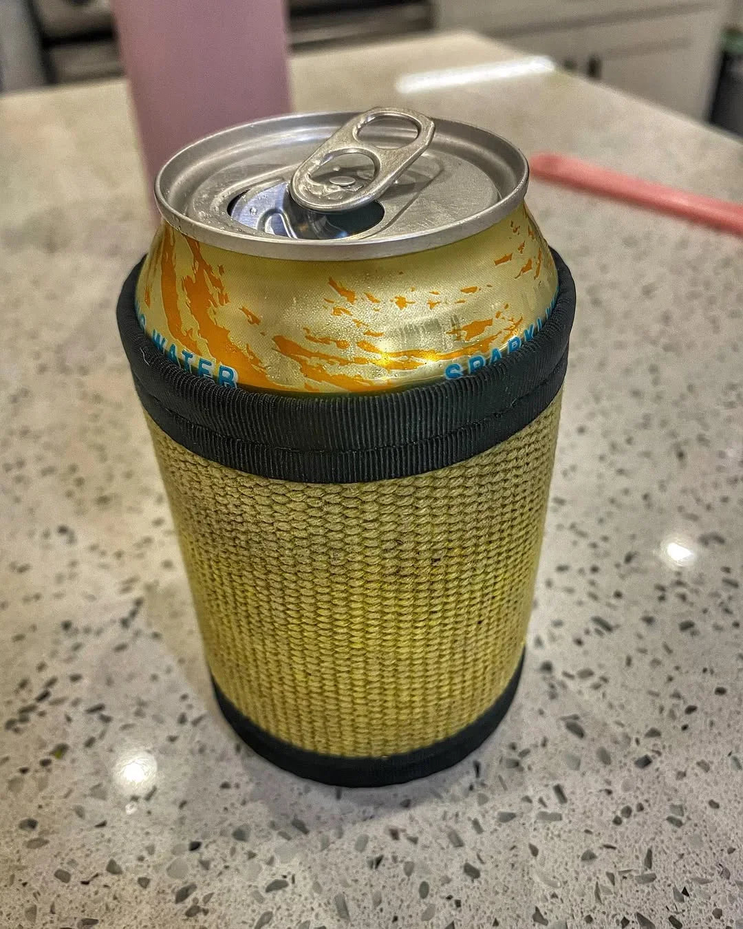 Recycled Firefighter Firehose drink sleeve in standard size, featuring a rugged firehose design for keeping beverages cold.