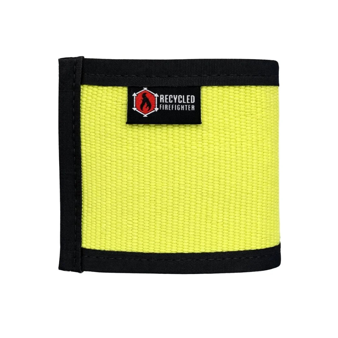 Yellow Firehose drink sleeve by Recycled Firefighter, designed to keep beverages cold and showcase firefighting gear style.