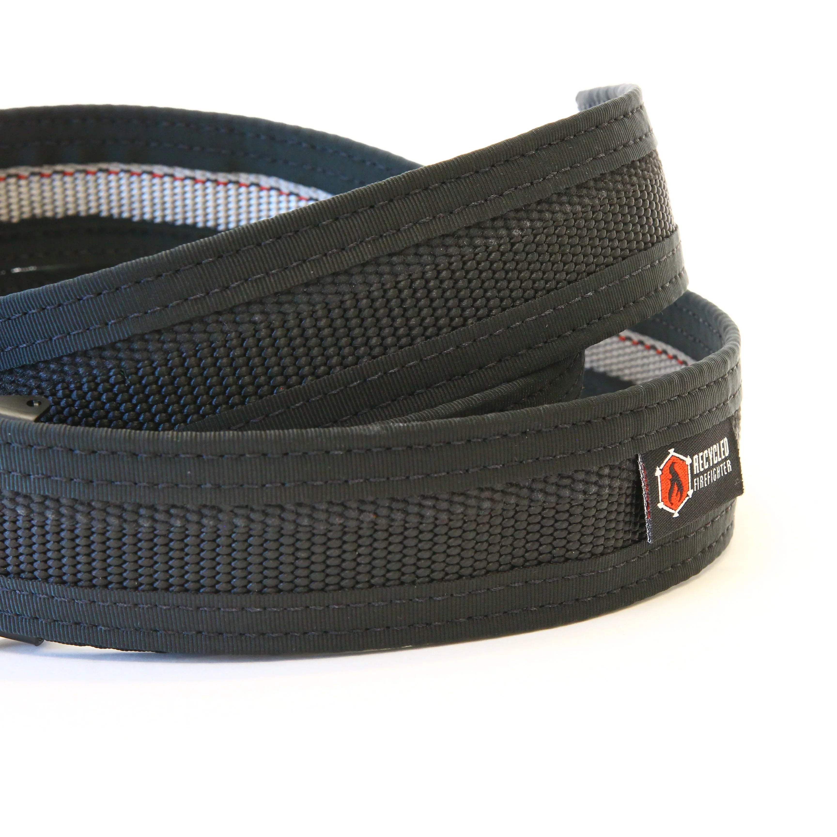 Black Fire Hose EDC Belt by Recycled Firefighter, showcasing durable material and a sturdy buckle design.