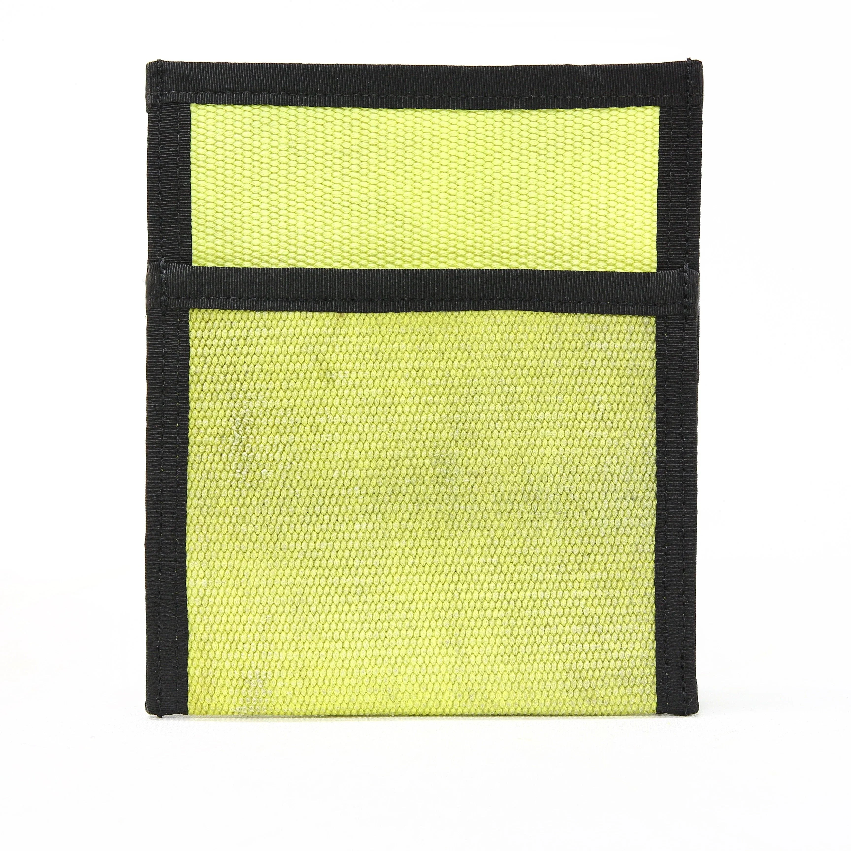 Recycled Firefighter fire hose tool pouch with multiple pockets, showcasing durable material and functional design.
