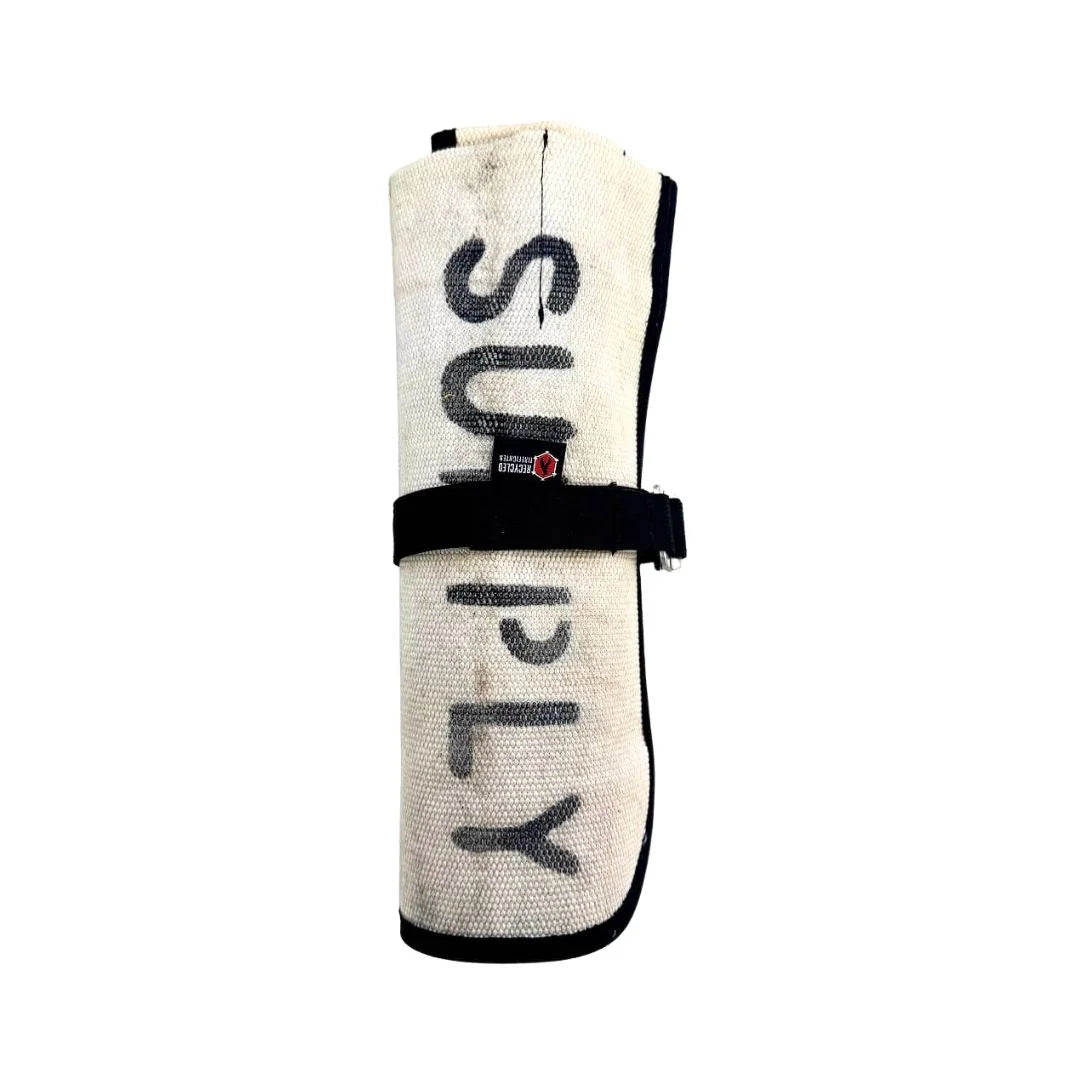 Recycled Firefighter vintage white fire hose tool roll with multiple compartments for organizing tools.