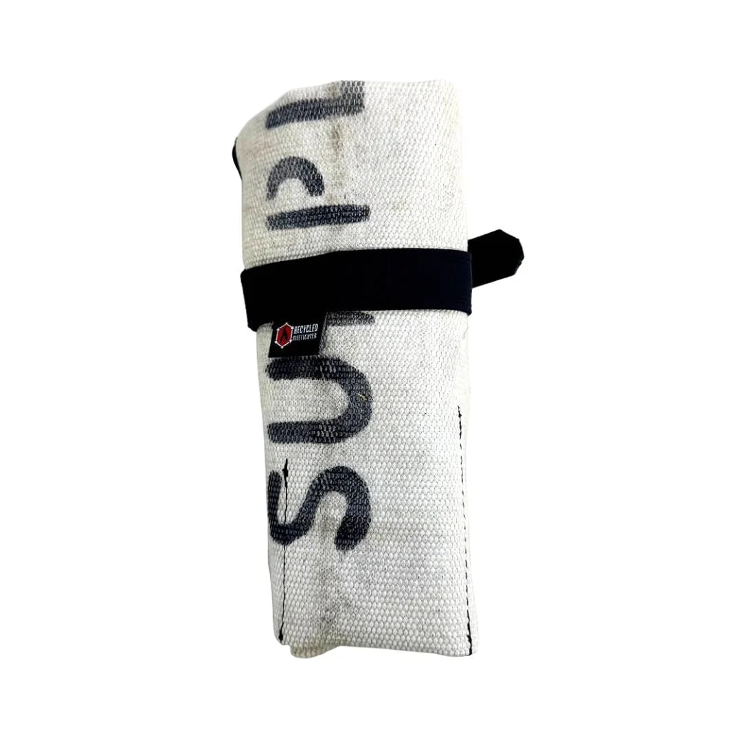 Vintage white Recycled Firefighter fire hose tool roll with multiple compartments for organizing tools.