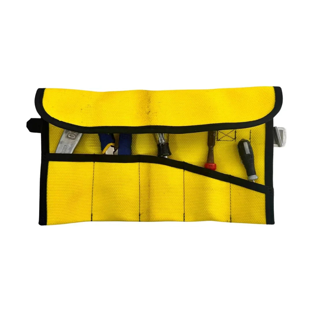 Yellow Recycled Firefighter fire hose tool roll with multiple compartments, compact and durable for storing firefighting tools.