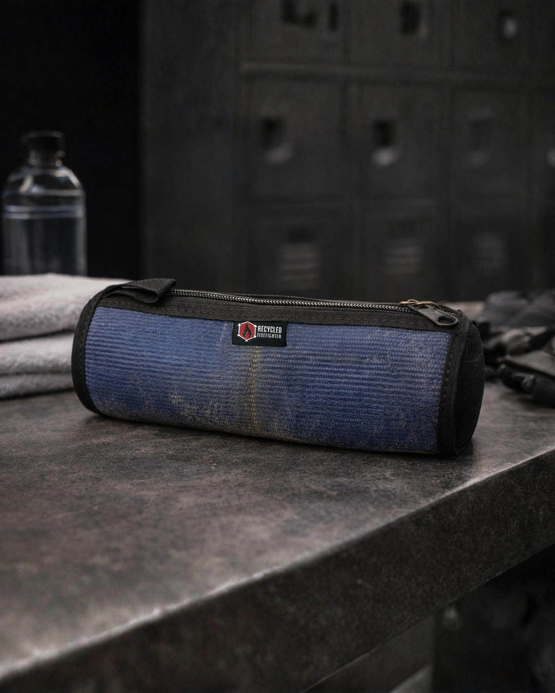 Recycled Firefighter fire hose Dopp Kit with durable fabric and zipper closure, designed for travel and everyday use.