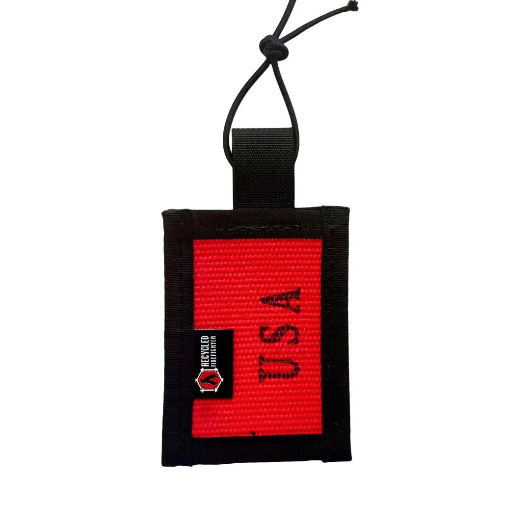 Red Firehose Luggage Tag by Recycled Firefighter featuring USA flag design, made from recycled firefighter materials.