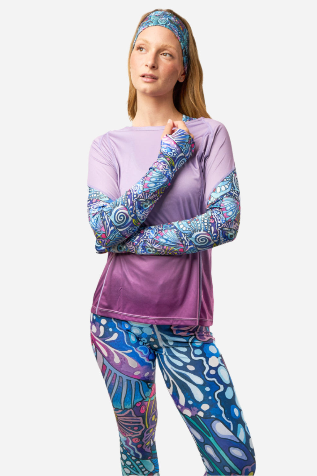 Gray Enchanted FisheWear Signature Leggings with intricate pattern, close-up of the fitted, stretchy leggings on a model.