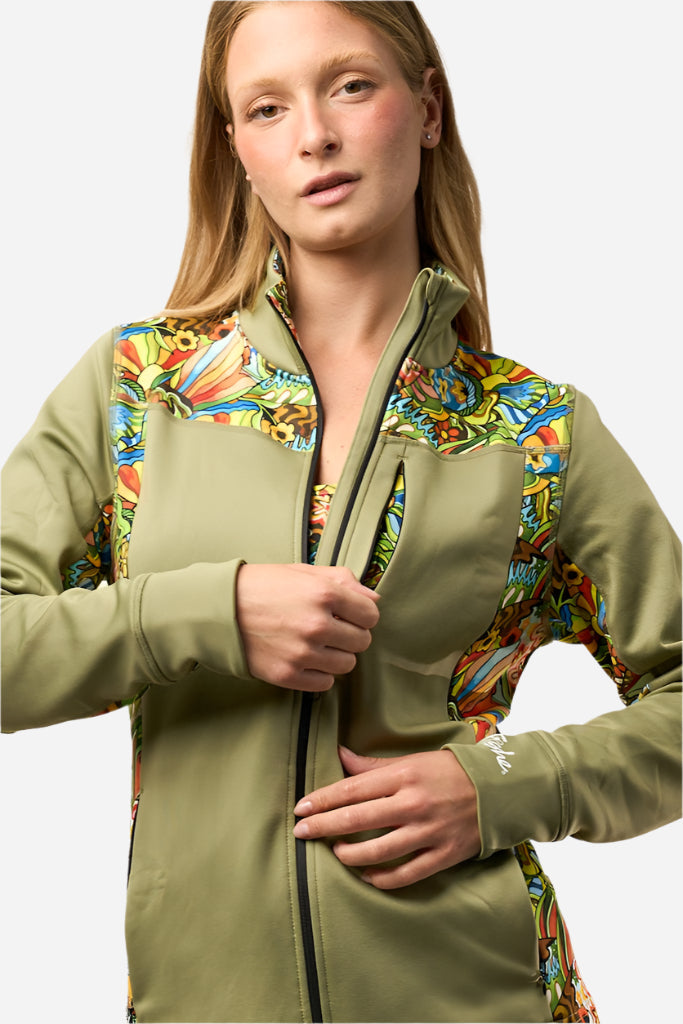 FisheWear Boho Bass Midlayer Jacket in earthy tones, lightweight with a relaxed fit, displayed on a hanger.