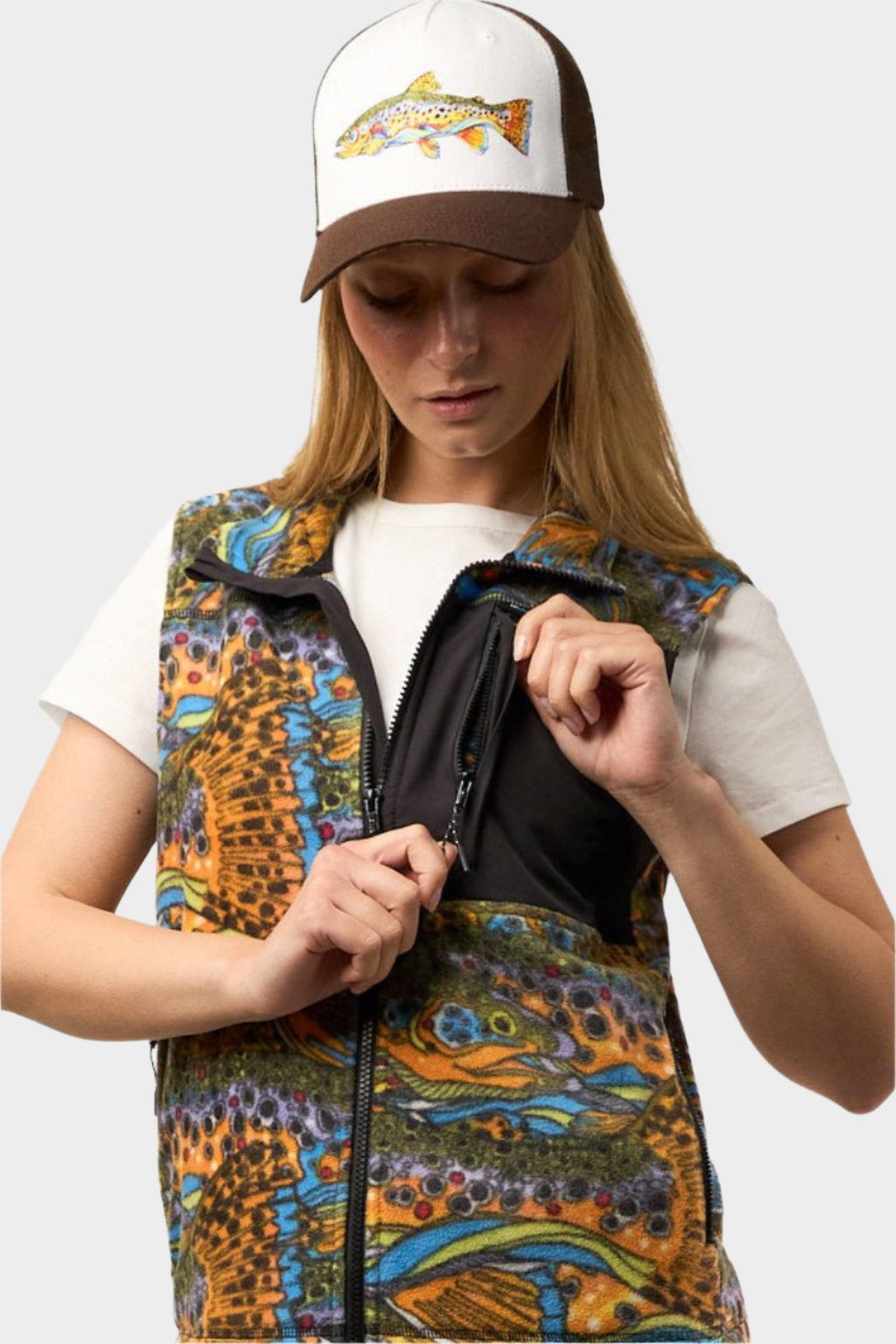 FisheWear Unbound brown fleece vest laid flat, showcasing its soft fleece fabric and simple design.