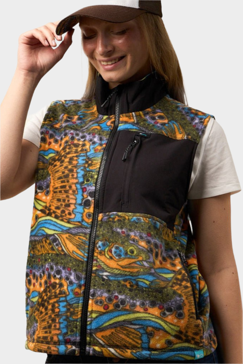 FisheWear Unbound brown fleece vest with a soft, cozy texture, displayed on a model in a studio setting.