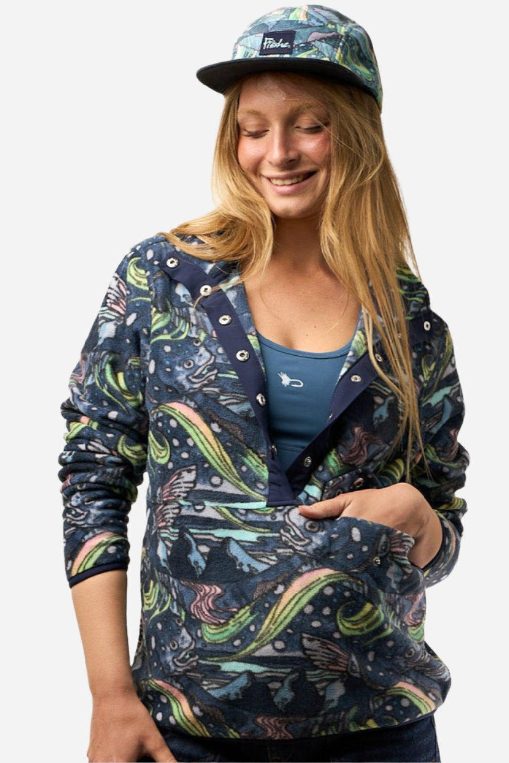 FisheWear HaliBorealis Riffle Snap Fleece in navy, close-up of soft fleece fabric with snap buttons and fleece branding.
