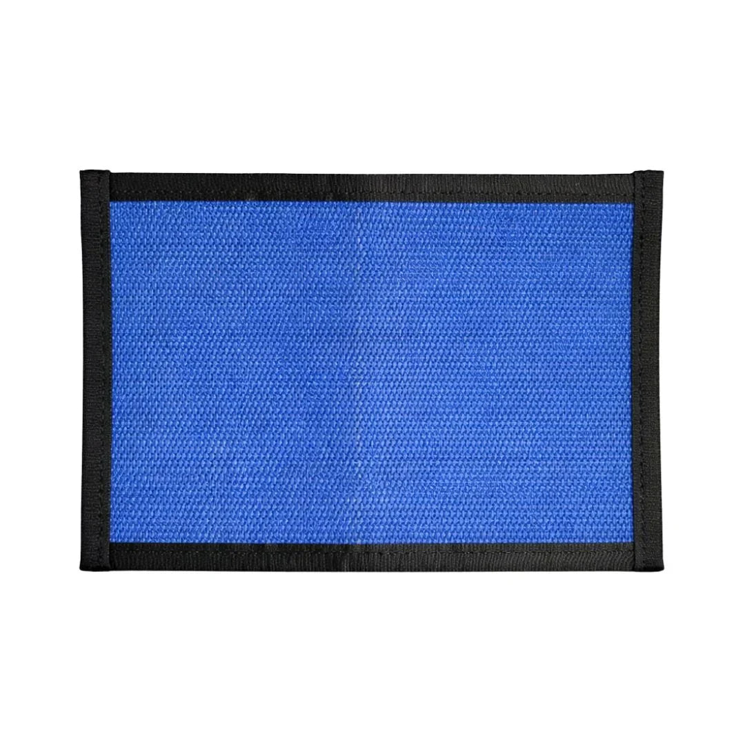 Flat EDC pouch in blue and black, made from recycled firehose, featuring a zippered closure by Recycled Firefighter.