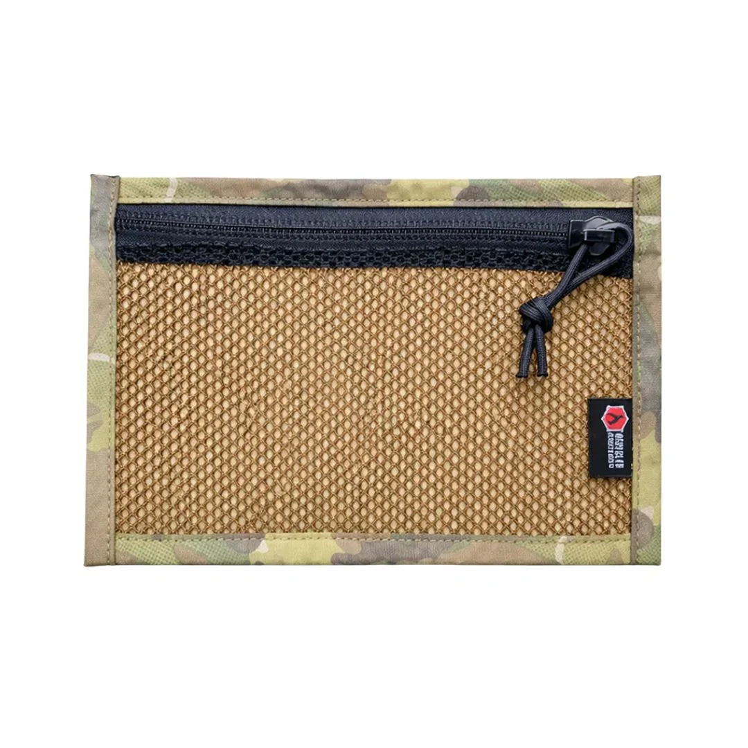 Flat EDC pouch by Recycled Firefighter in orange and multicam, featuring a durable zippered design for everyday carry.