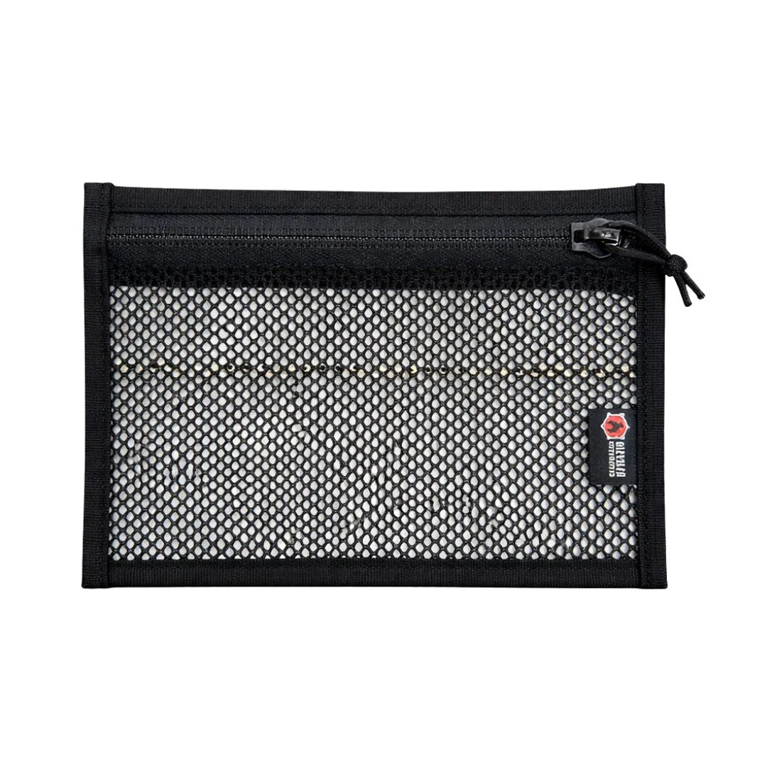 Flat EDC pouch by Recycled Firefighter, zippered design in rubber and black, showcasing durable firehose material.
