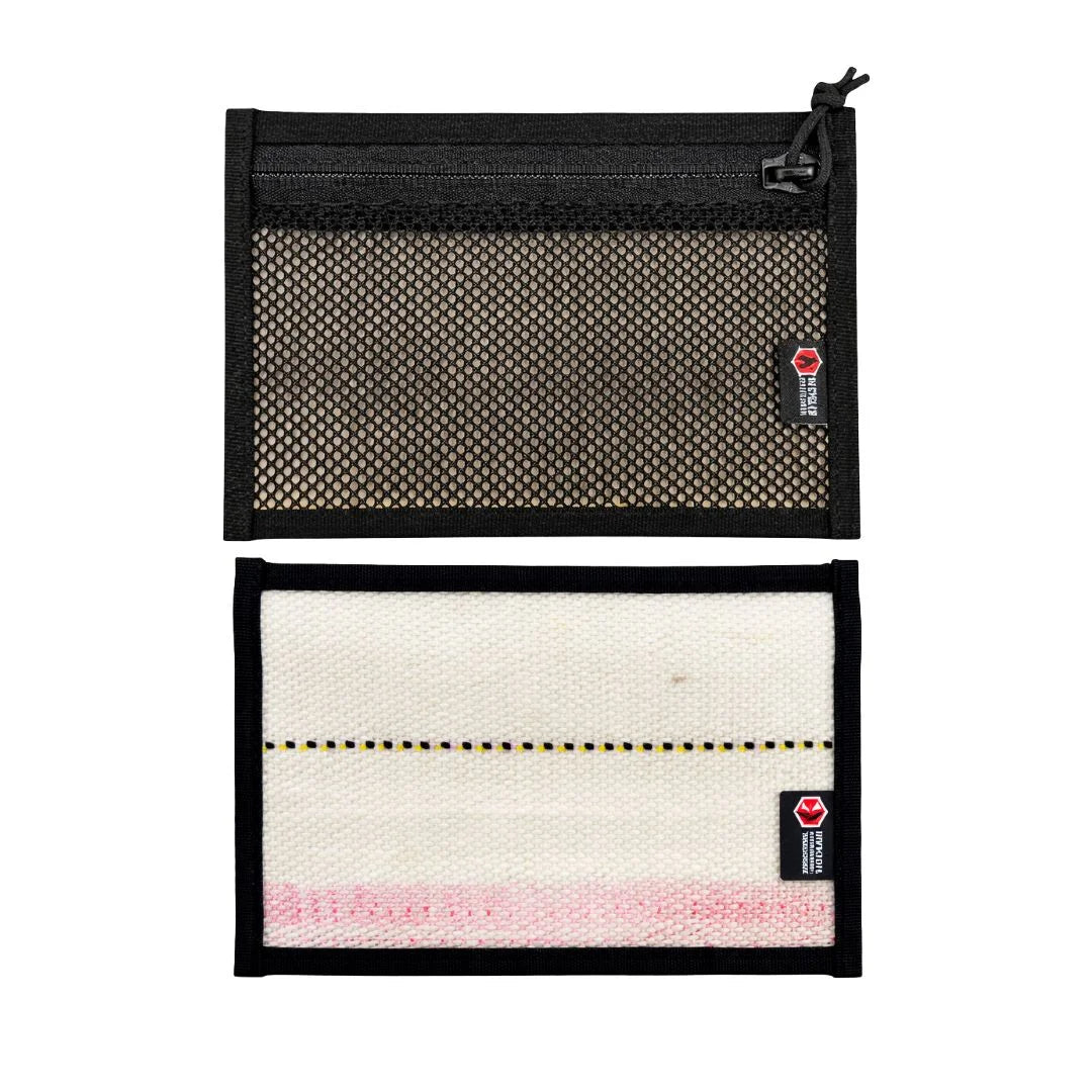 Flat EDC pouch in firehose edition, featuring a zippered design in white and black from Recycled Firefighter.