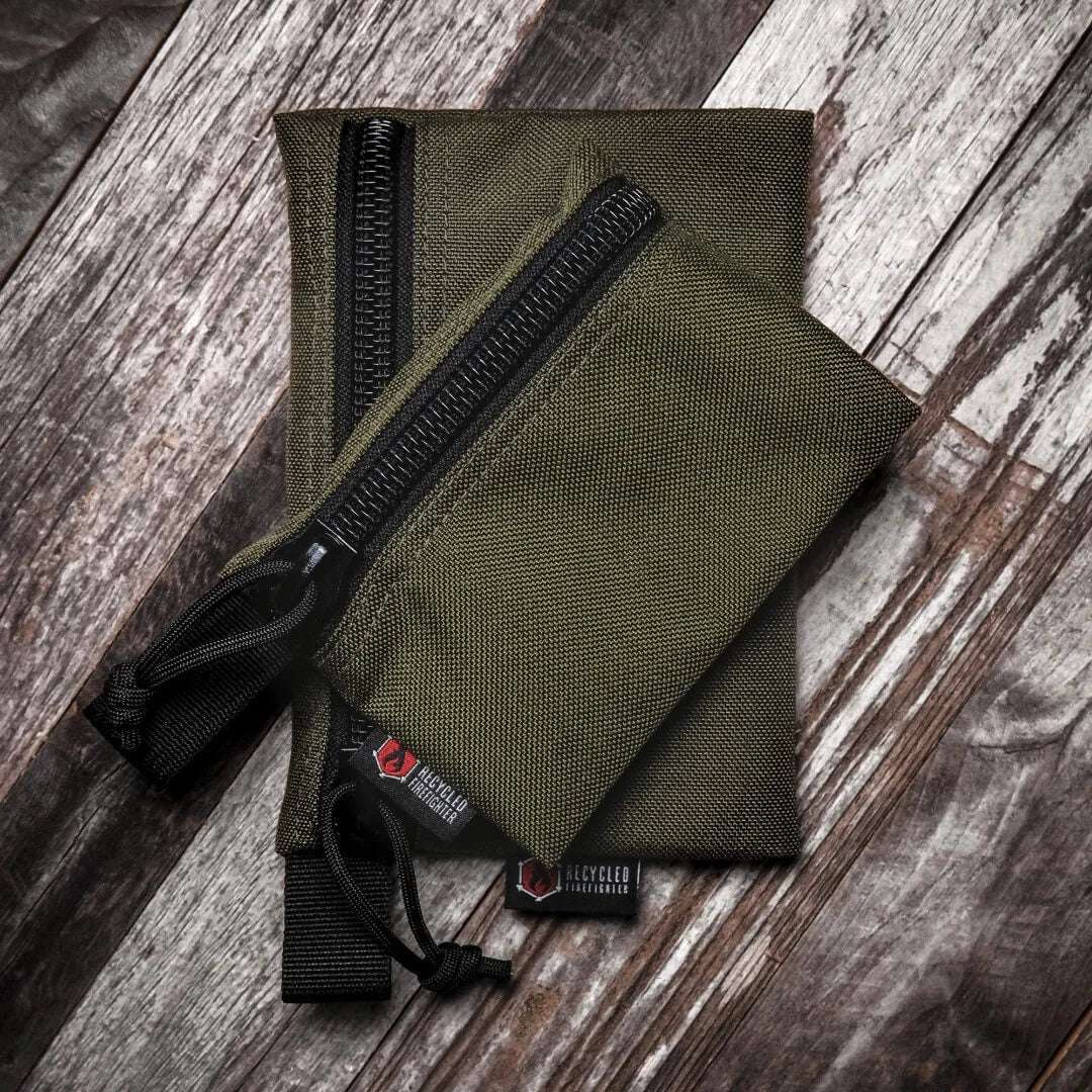 Large flat zippered gear pouch by Recycled Firefighter, made from recycled materials, with a sleek design and sturdy zipper.