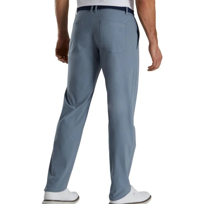 FootJoy Performance Knit golf pants in graphite, lightweight and comfortable for active wearing, shown in a natural stance.