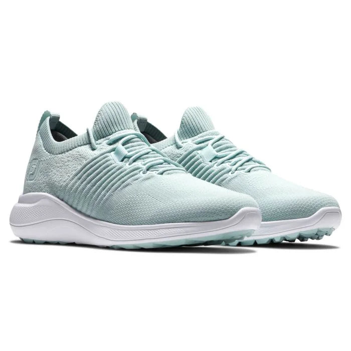 FootJoy Women's Flex XP golf shoes in black and white, with sporty design and comfortable fit for women golfers.
