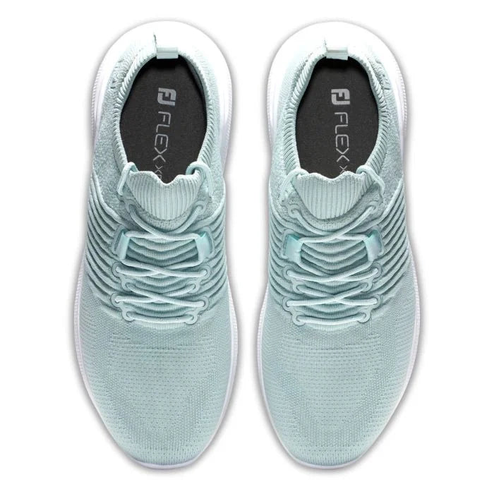 FootJoy Women's Flex XP golf shoes in white with blue accents, featuring breathable mesh and supportive outsole for comfortable golf footwear.
