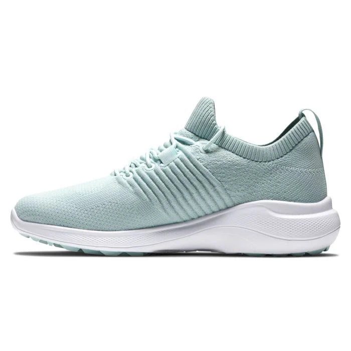 FootJoy Women's Flex XP golf shoes in white with black accents, designed for comfort and performance on the golf course.