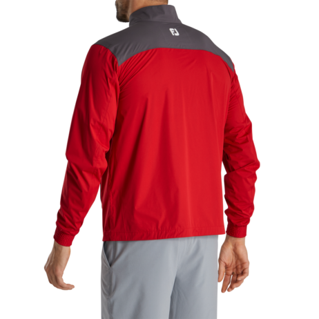 Footjoy HydroKnit pullover in navy, lightweight golf clothing from ParWestGolf, featuring a high collar and moisture-wicking fabric.
