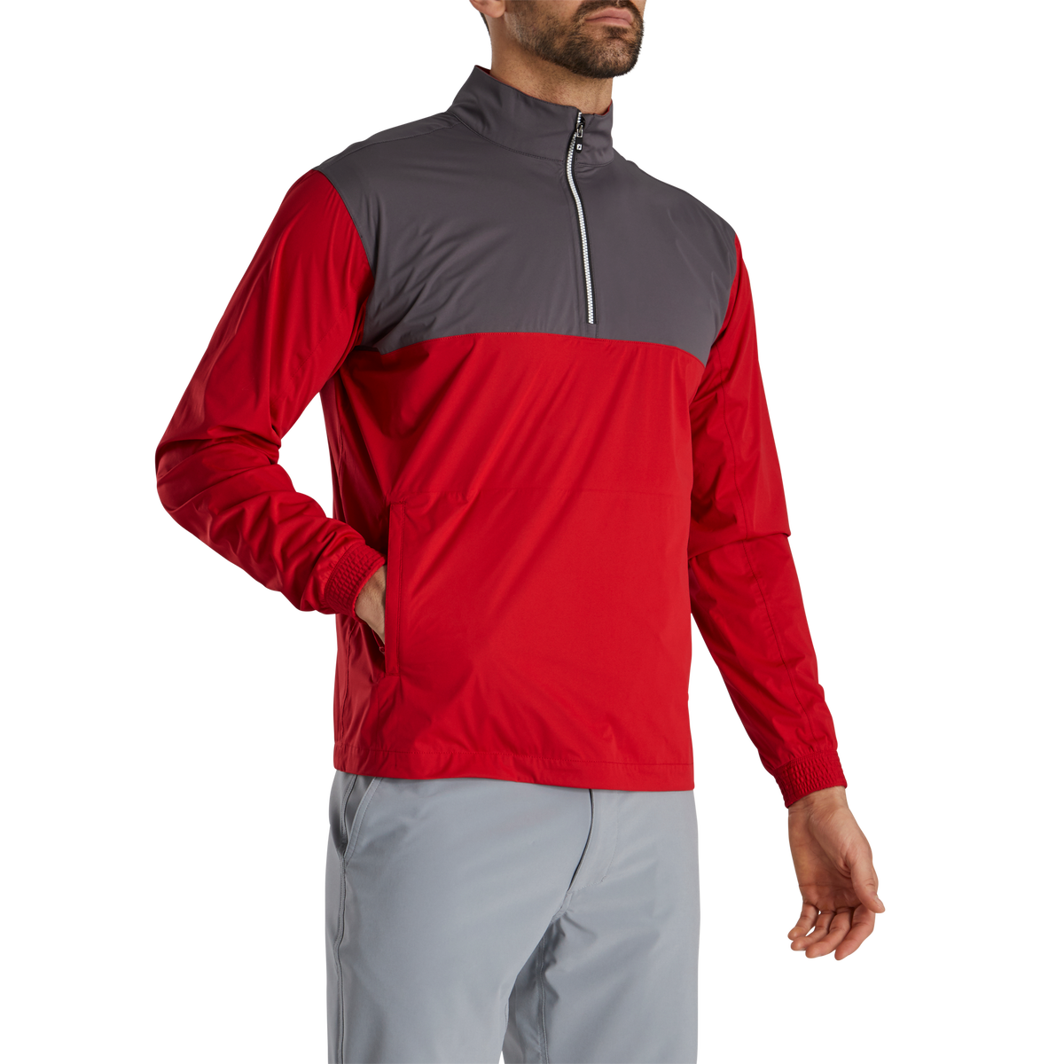 Footjoy HydroKnit pullover in navy, lightweight golf clothing with a high collar and moisture-wicking fabric, designed for comfort and performance.