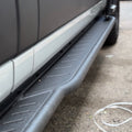 Avatar Offroad Ford Transit Rockbody side steps installed on van, durable steel side steps with textured surface for easy access.