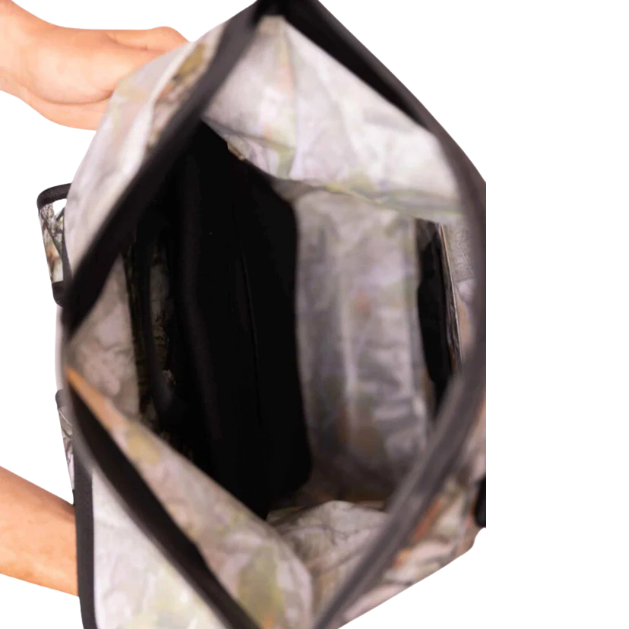 Forest camouflage waterproof floating dry backpack by Dry Pocket, designed for outdoor activities and secure storage in wet conditions.