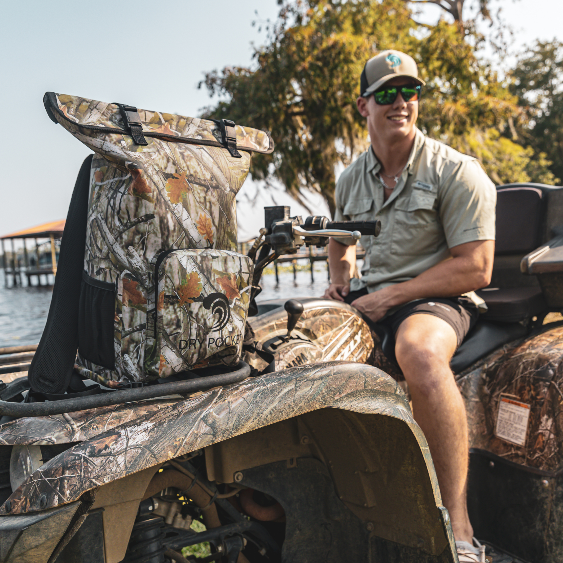 Forest camo Waterproof Floating Backpack Dry Bag by Dry Pocket, designed for outdoor travel and water protection.