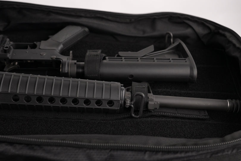 Elite Survival Systems Summit discreet rifle backpack with multiple compartments and padded straps for secure, comfortable carrying.
