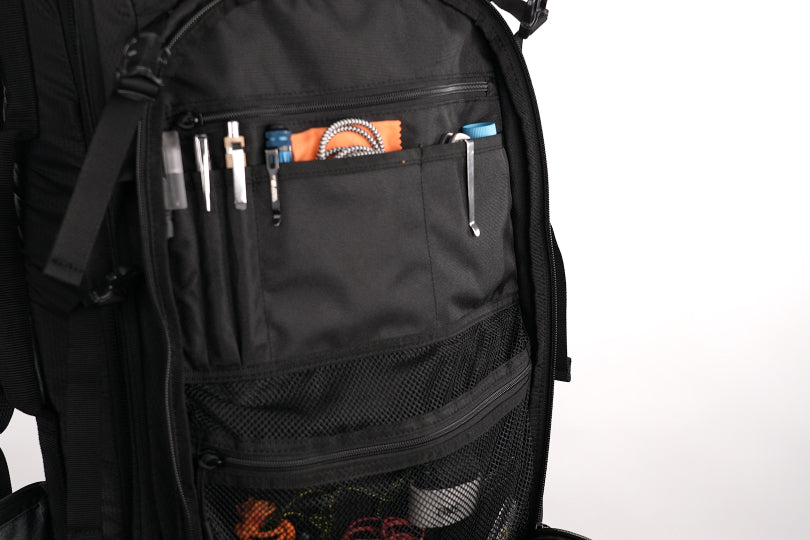 Elite Survival Systems SUMMIT discreet rifle backpack with multiple compartments and adjustable straps for secure firearm transport.