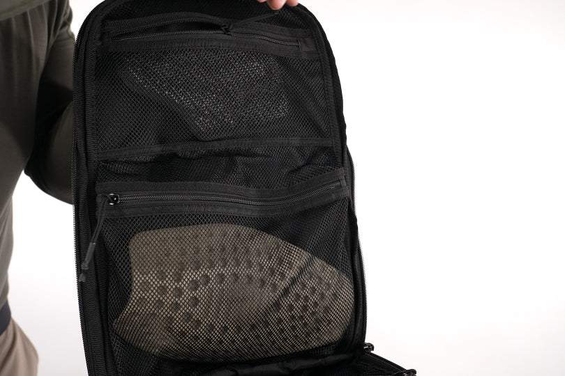 Elite Survival Systems Summit discreet rifle backpack with multiple compartments and padded straps for secure outdoor carry.