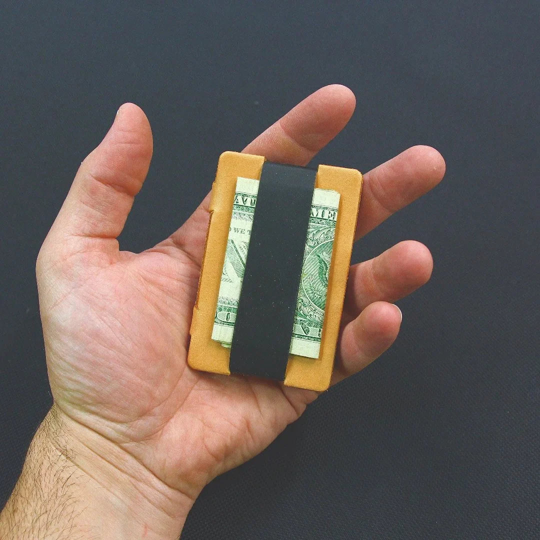 Full grain leather card wallet by Recycled Firefighter featuring multiple card slots and a sleek, durable design.