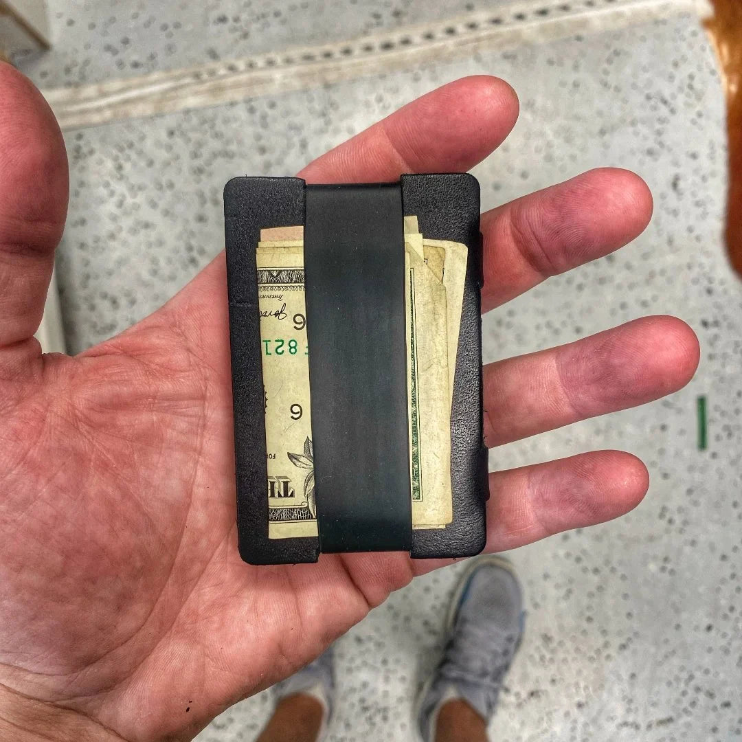 Full grain leather card wallet by Recycled Firefighter showing multiple card slots and sleek design.