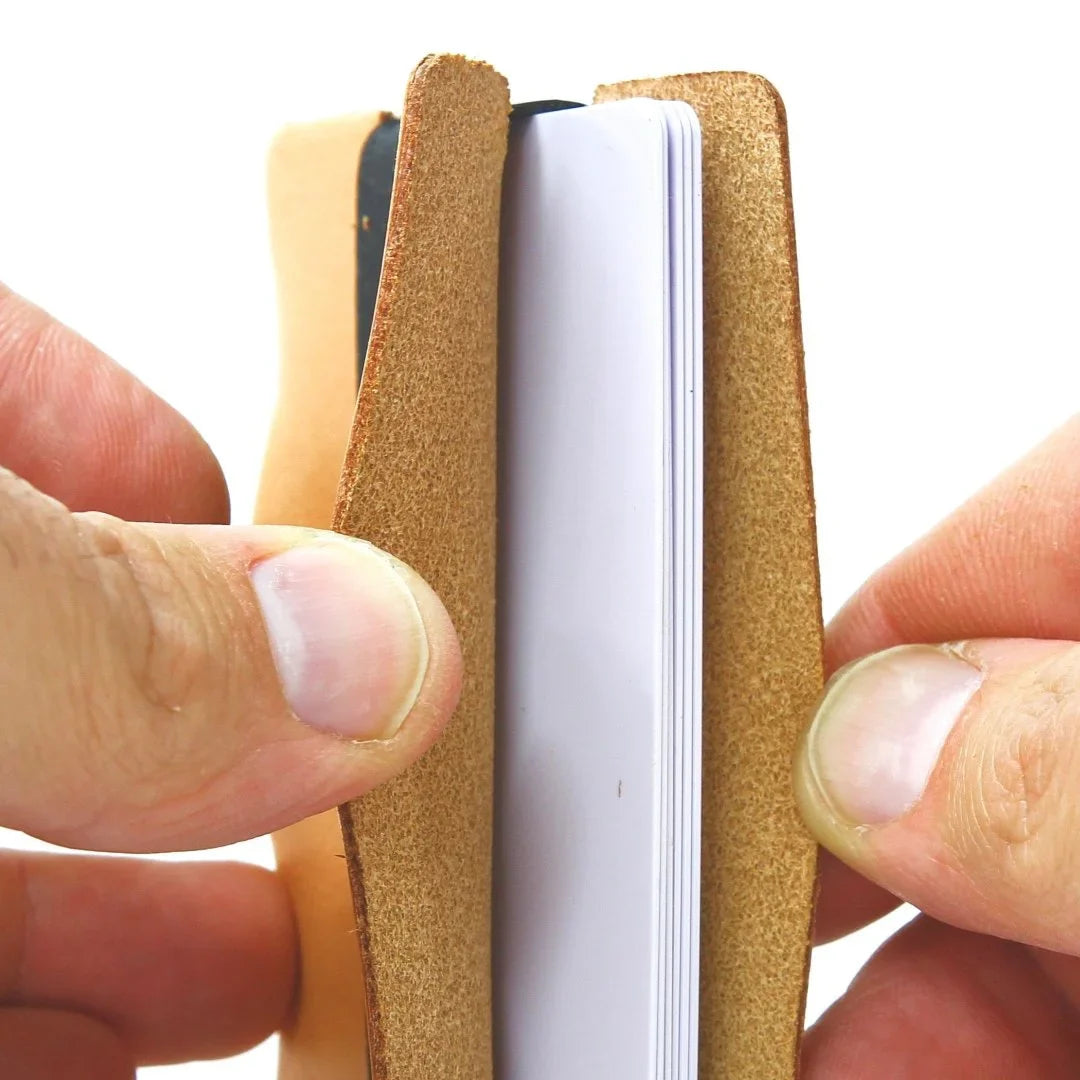 Full grain leather card wallet by Recycled Firefighter, featuring a sleek, minimalist design with multiple card slots.