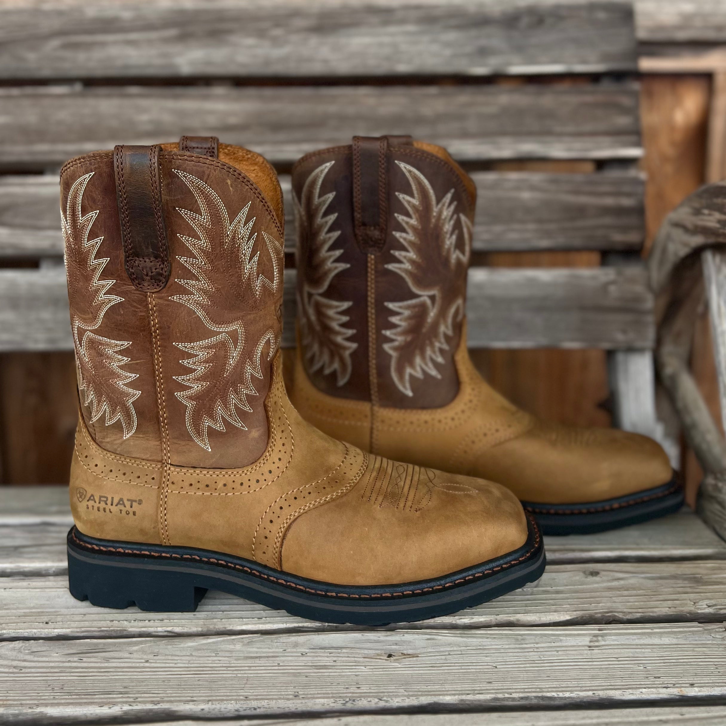 Ariat men's Sierra steel toe work boots with rugged design and durable leather, ideal for tough job conditions.