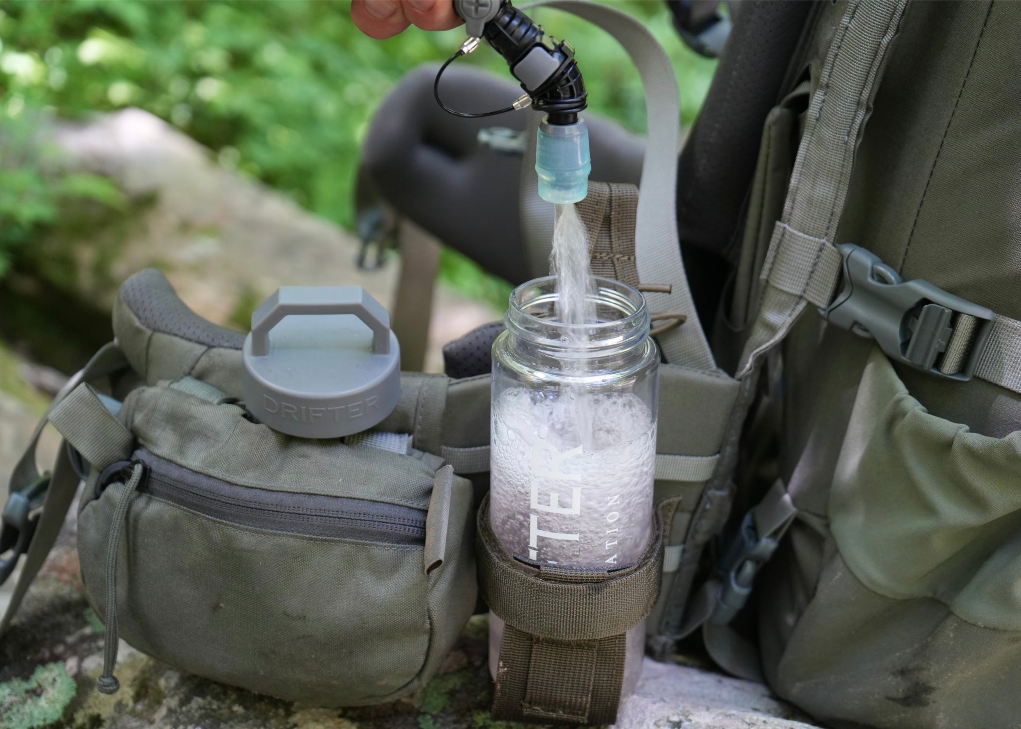 Drifter Hydration System bundle featuring a water bladder and accessories for outdoor hydration needs.