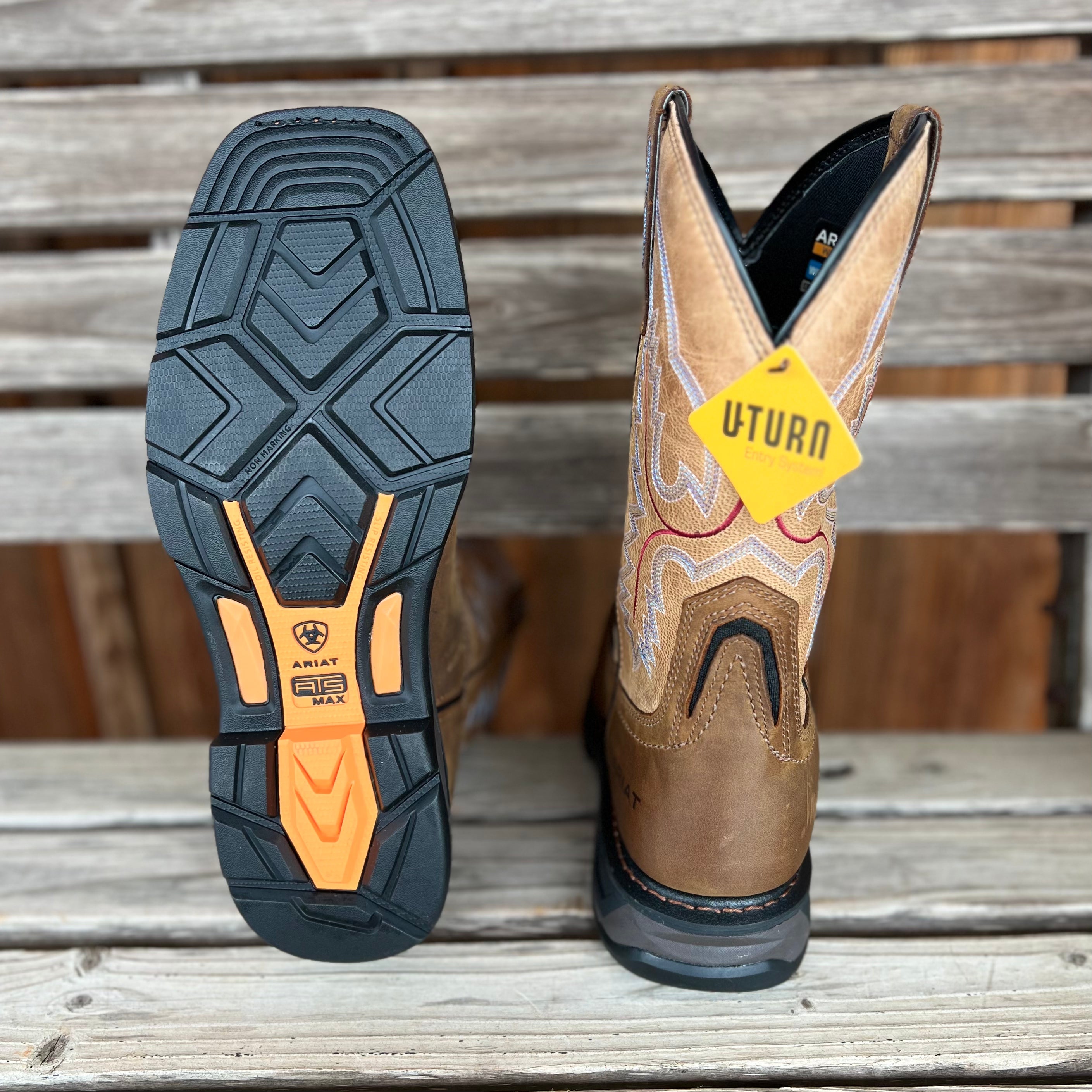 Ariat Workhog XT H20 men's work boots in brown leather with rugged soles and waterproof design, suitable for heavy-duty work.