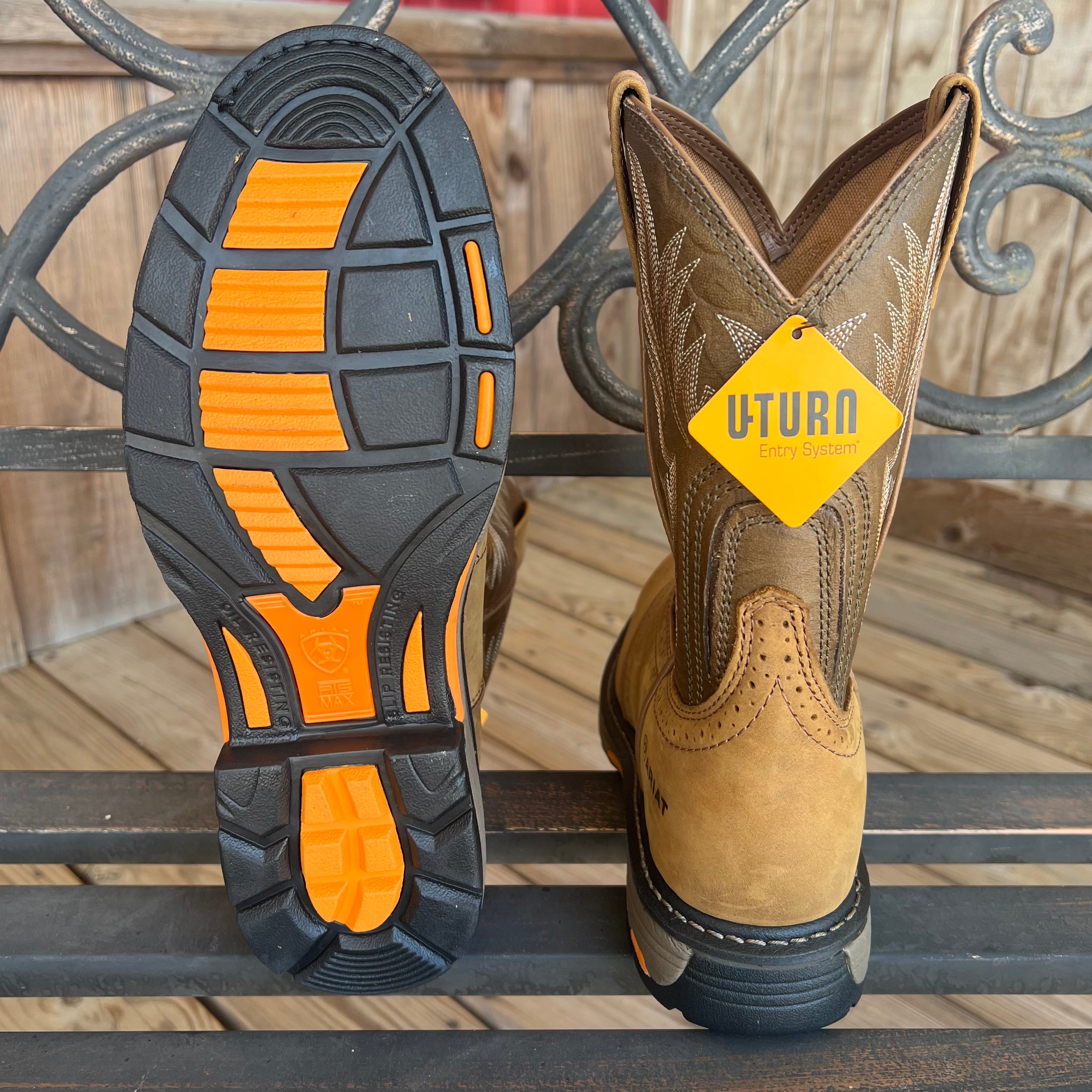 Ariat Mens Workhog Round Toe work boots with leather upper and rugged sole, designed for durability and outdoor work.
