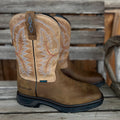 A pair of Ariat Workhog XT H20 men's work boots featuring durable leather and waterproof design, shown from the front angle.