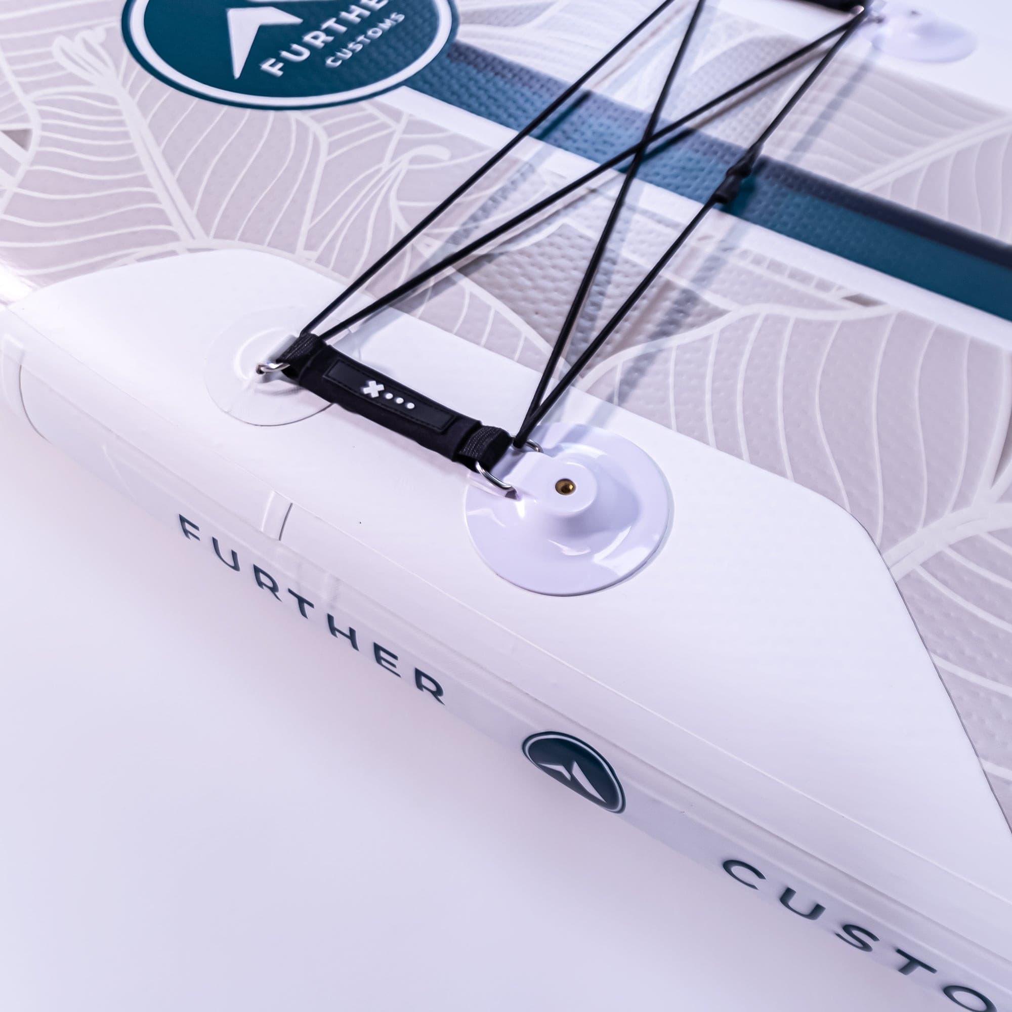 11'0 Further Customs Avalon Emerald paddleboard in action on water, showcasing vibrant color and sleek design.