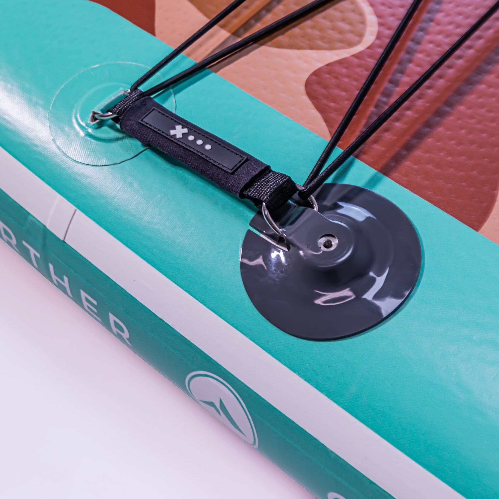 Further Customs 11'0 Tamarack Sage paddleboard with action mount, showcasing its sleek design and durable construction.