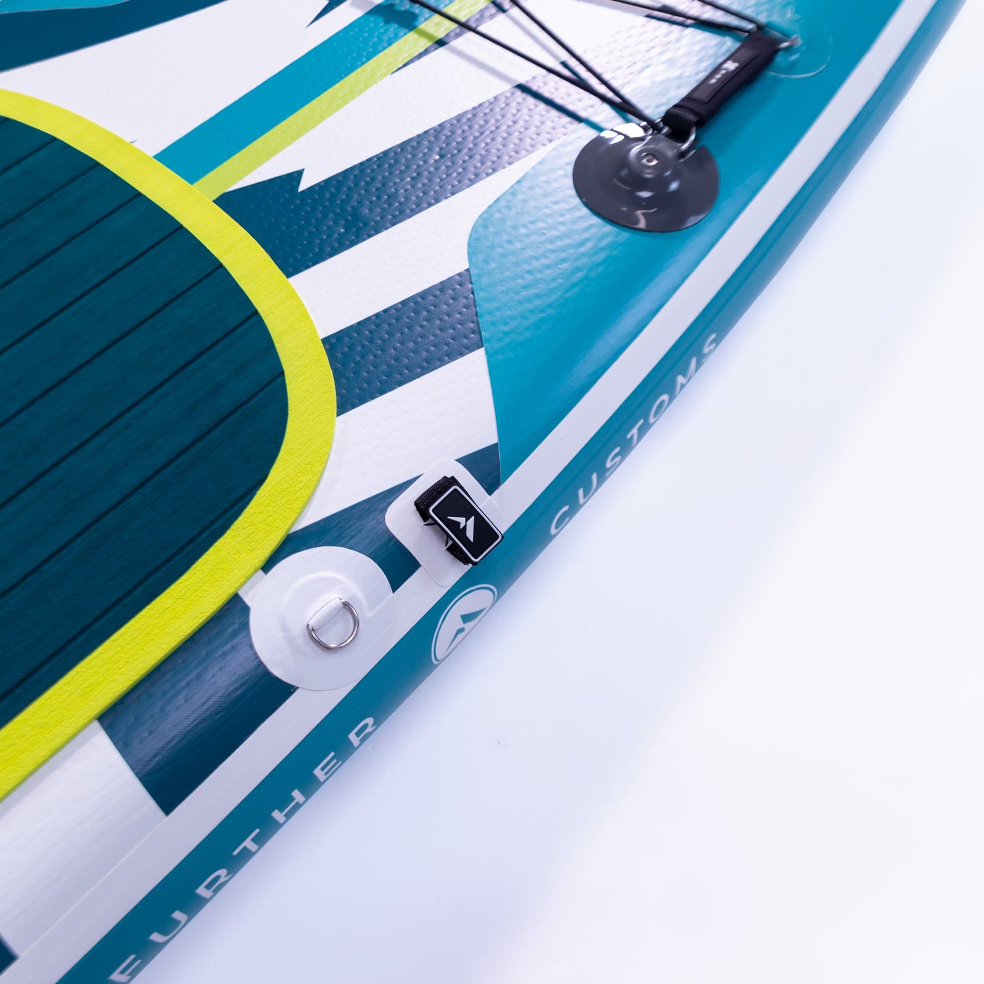 Turquoise 11'3" Podium paddleboard by Further Customs with fastener system, shown on water for stable paddleboarding.