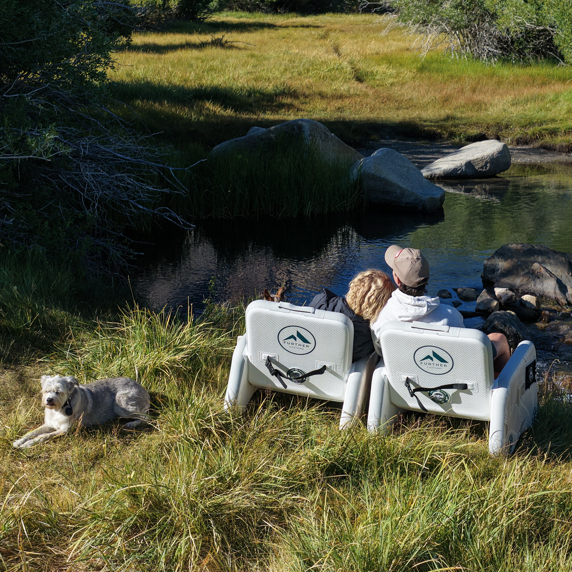 Further Customs inflatable captain's chair in a camping setting by Mammoth Lakes, showcasing its comfortable design.