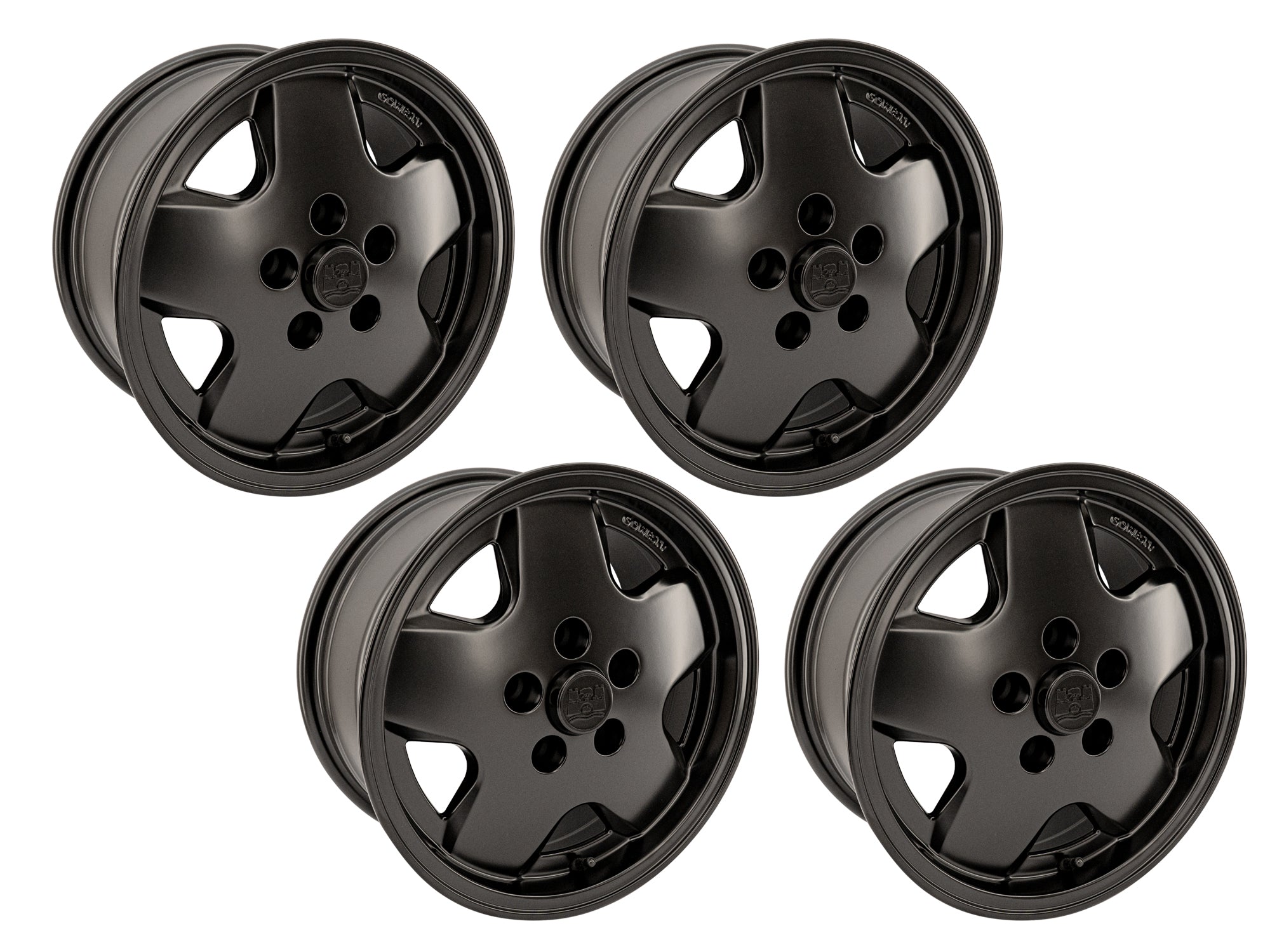 Set of four black GoWesty OEM replica alloy wheels for Bus and Vanagon, featuring durable rims and a sleek design.
