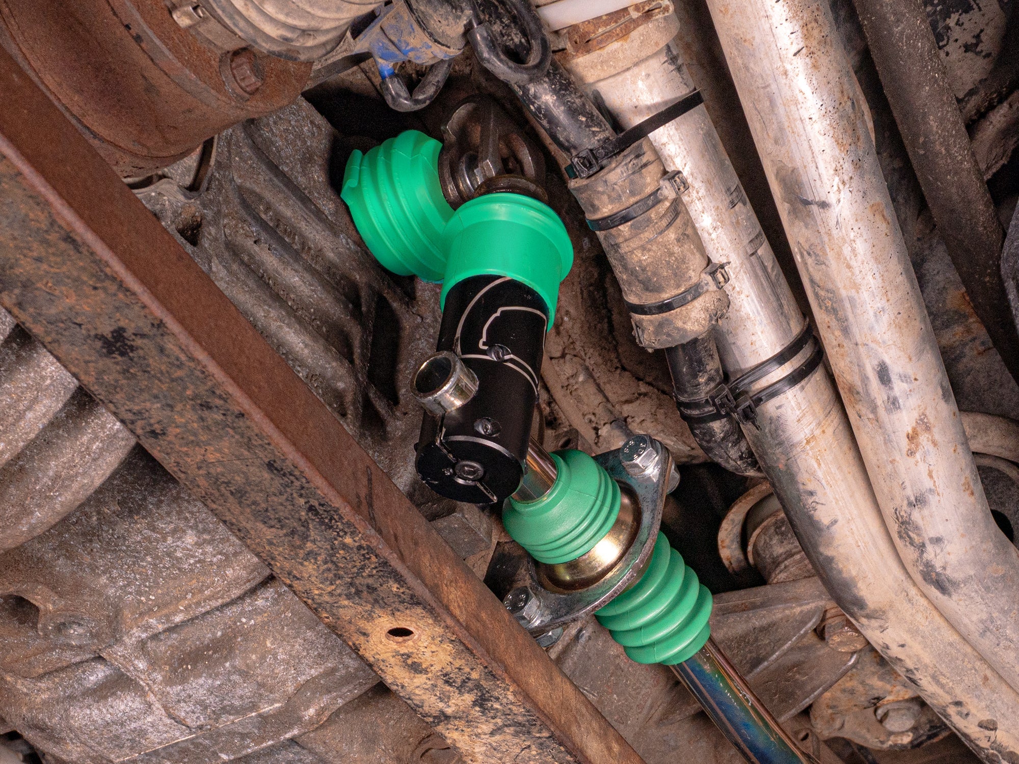 GoWesty Vanagon shift rod bushing and boot bundle with Teflon and DuroGreen installed on a shift lever.